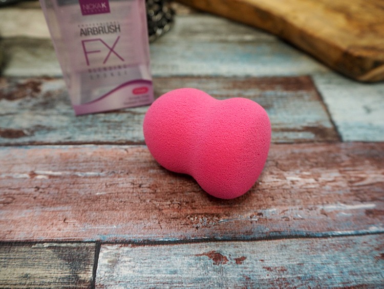 Nicka K Airbrush FX makeup sponge demonstrating pointed tip for precision