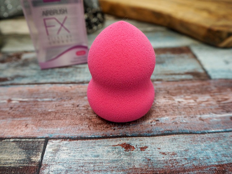 Close-up of Nicka K blending sponge texture showing soft material