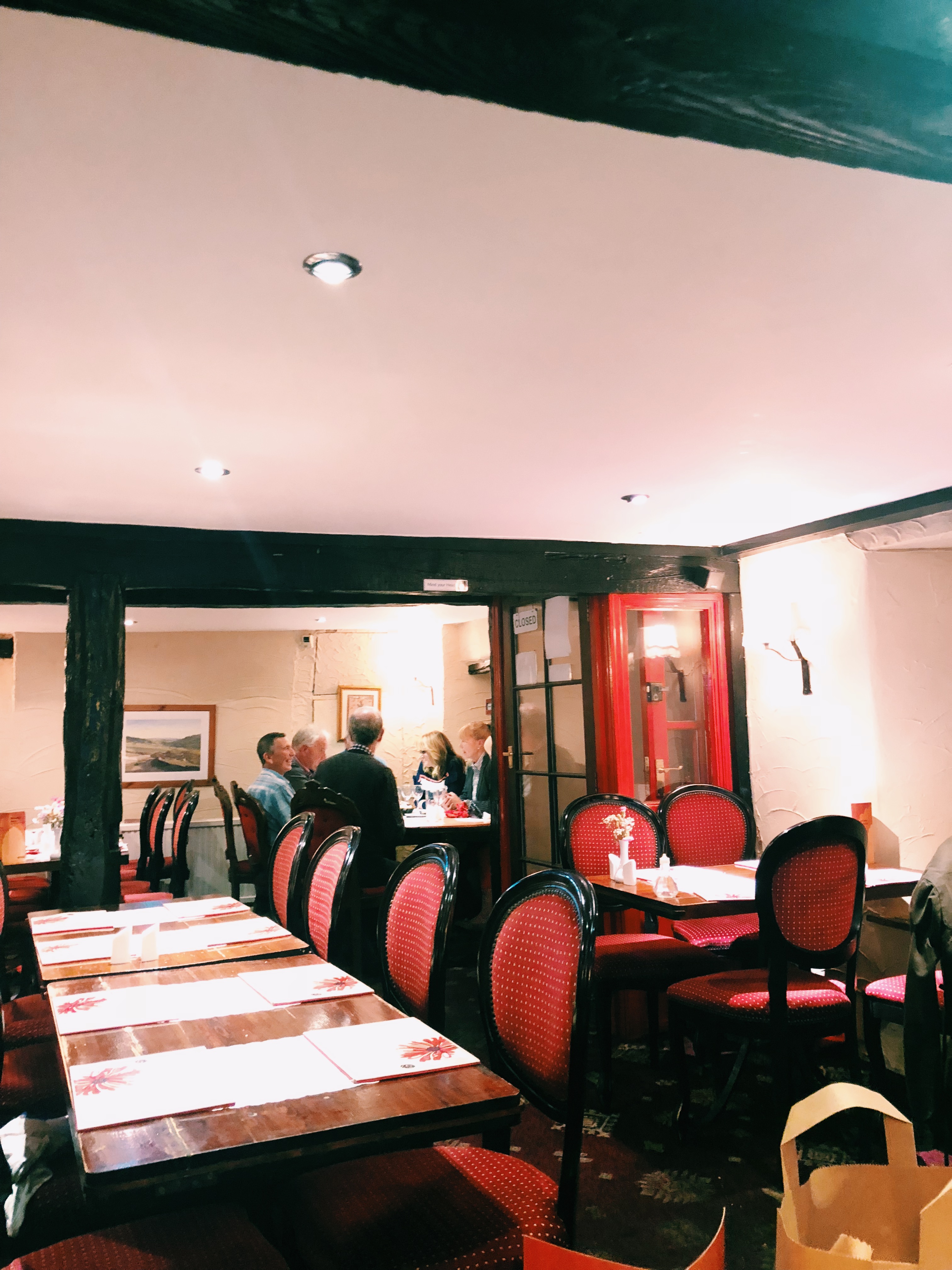 The cosy interior of the Helmsley Spice restaurant ready for evening diners