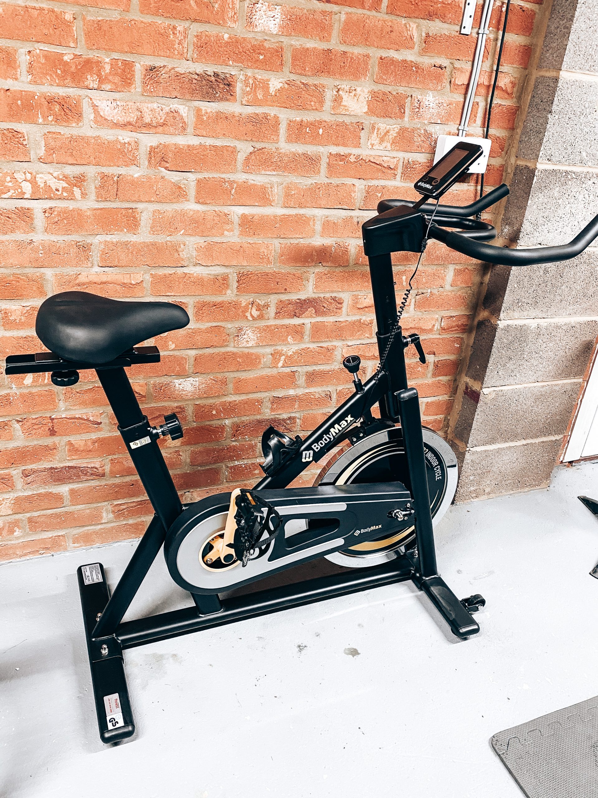 bodymax spin bike in home garage gym