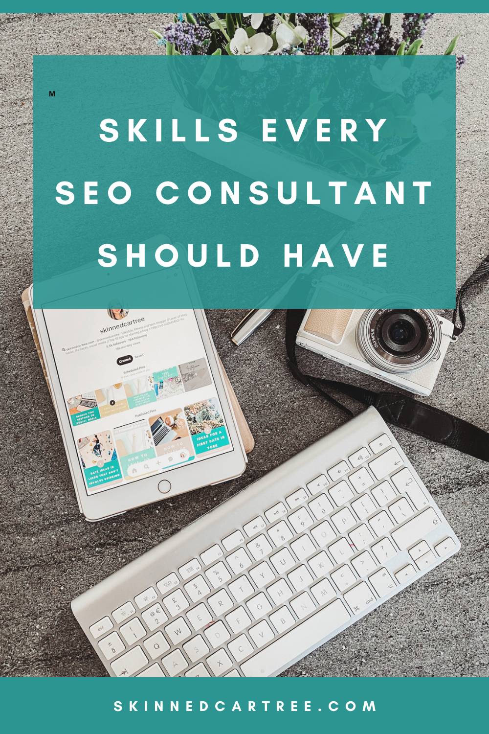 skills every SEO consultant should have text on a flat lay of an ipad, camera and keyboard