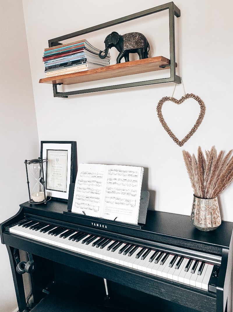 decorating a piano space image with an image of a piano styled in dark academia aesthetic