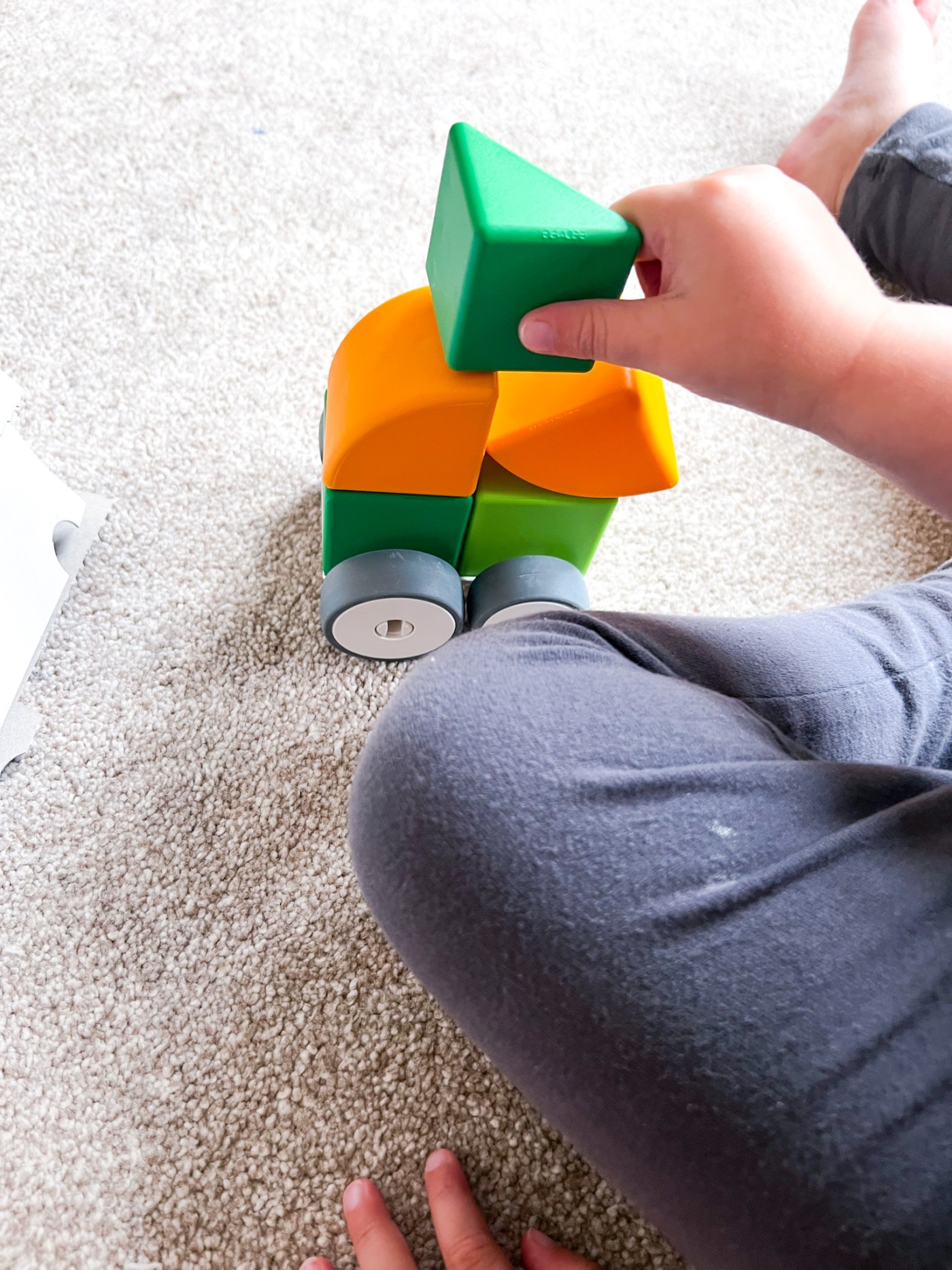 Child playing with Geomag Magicube