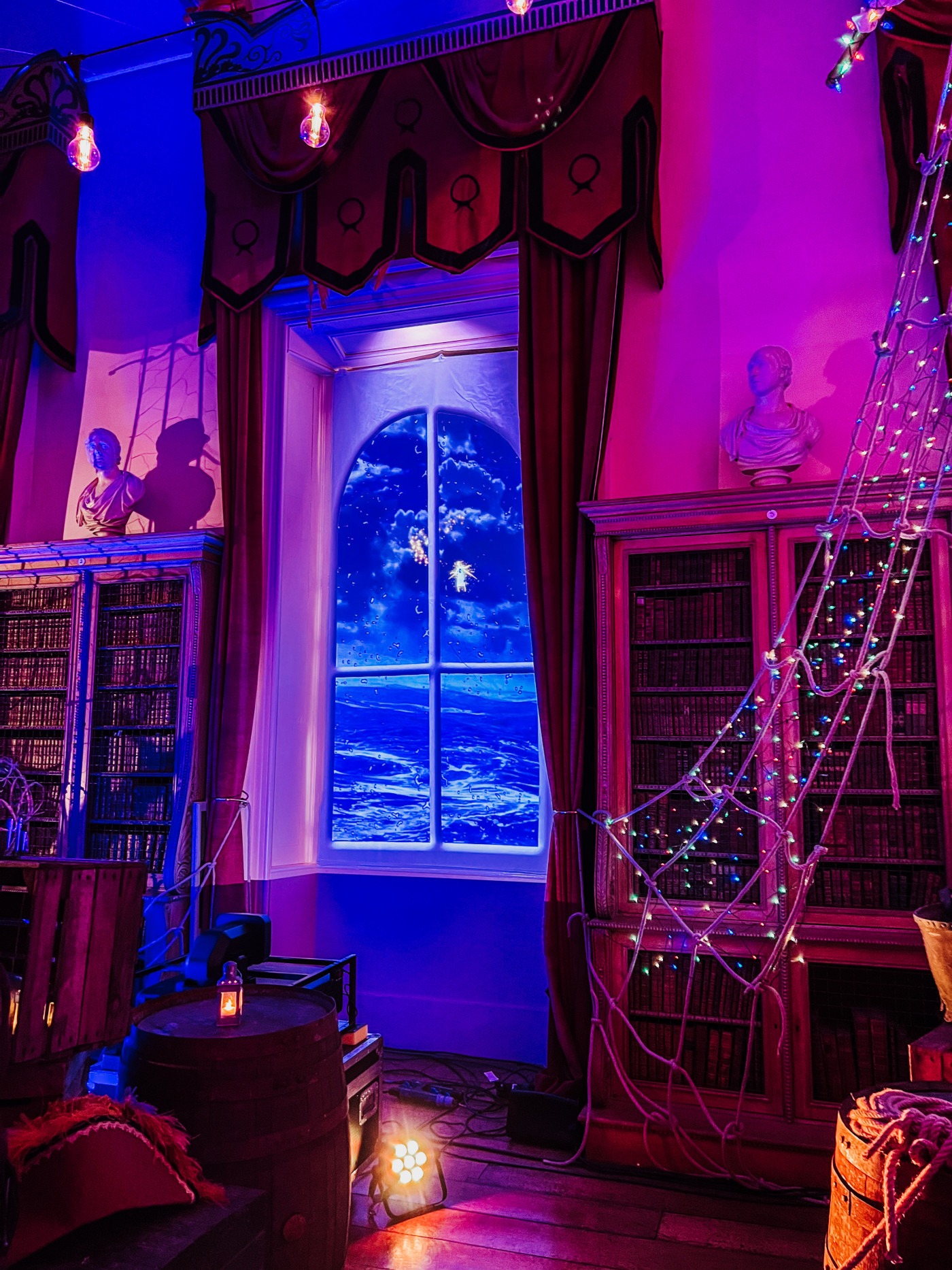 Captain Hook's cabin room at Castle Howard Christmas 2023 decorated with treasure chests and hooks