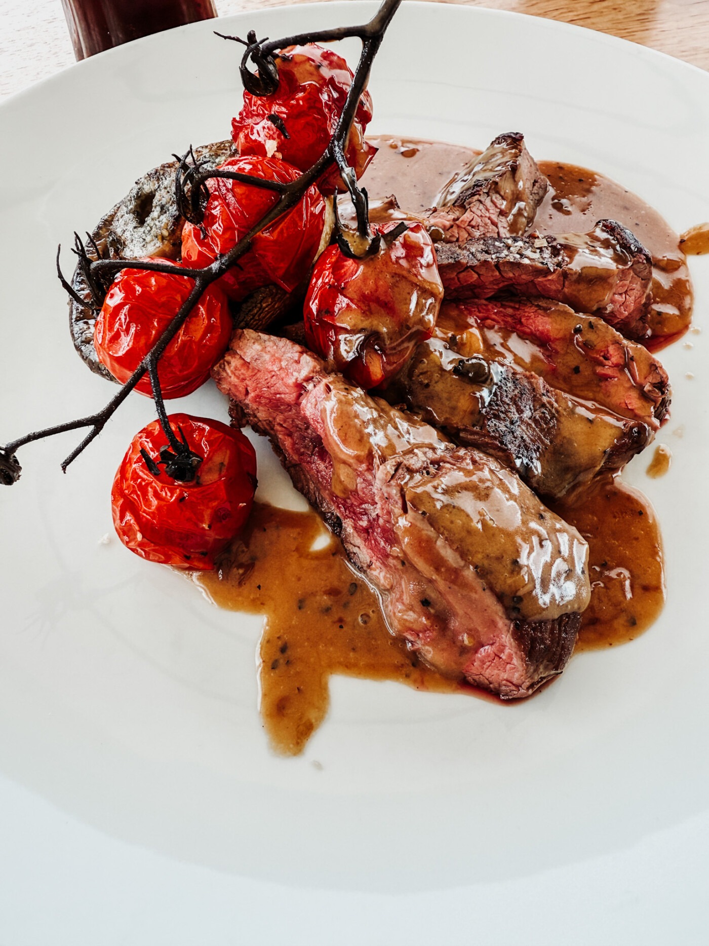 Onglet steak with chips, mushrooms and peppercorn sauce from The Stone Trough Inn menu