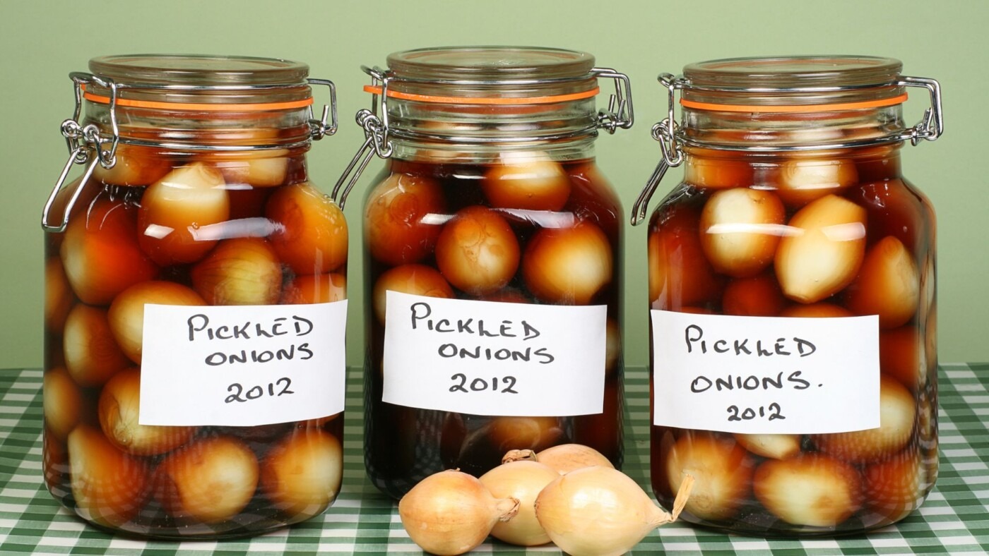 Homemade pickled onions in glass jar 
