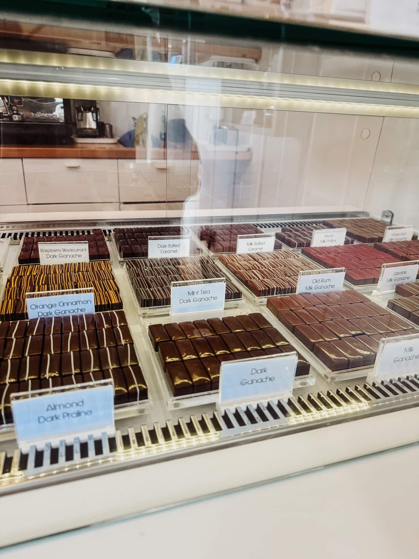 Interior of the Florian Poirot boutique in Malton with display cases of chocolates and dessert pots