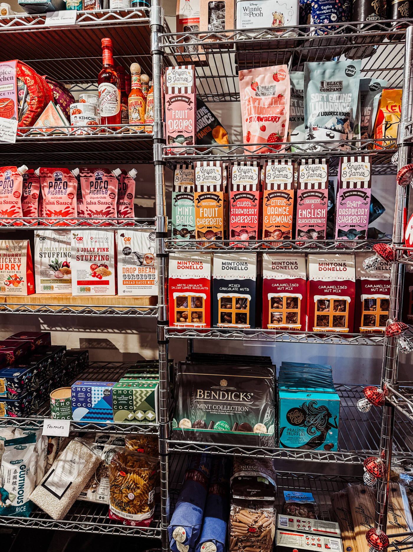 Local produce and condiments on the shelves at Malton Relish deli in Malton Market Place