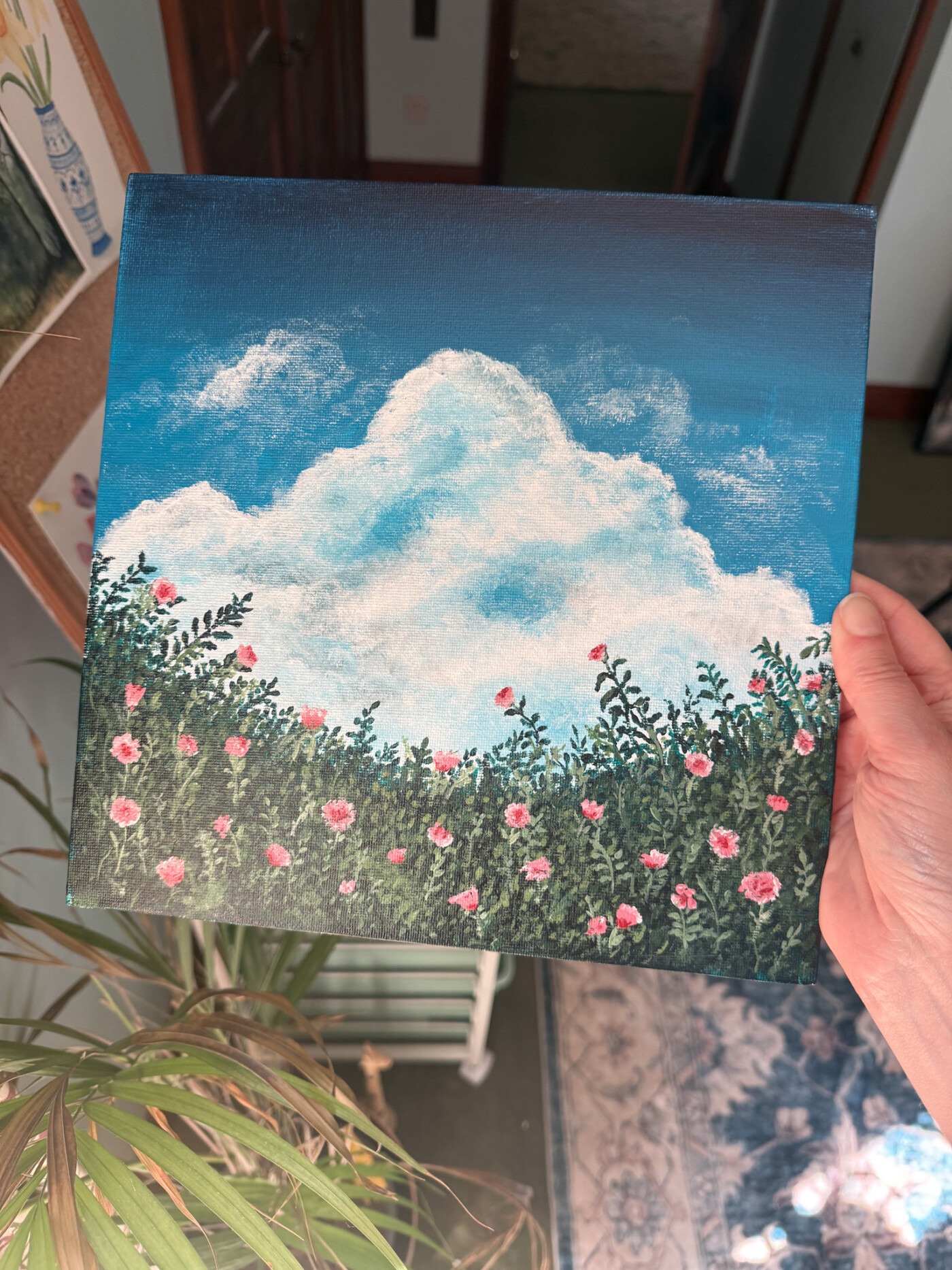 acrylic painting of flowers and the sky
